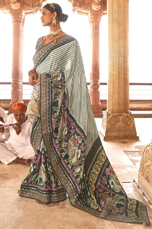 Function Wear Patola Silk Fabric Dark Green Color Printed Magnificent Saree With Semi Stitched Blouse Sheer Mesh Blouse Function Wear Patola Silk Fabric Dark Green Color Printed Magnificent Saree With Semi Stitched Blouse Sheer Mesh Blouse