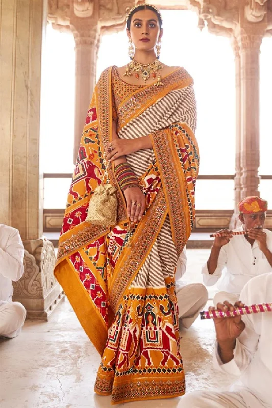 Patola Silk Fabric Printed Function Wear Vivacious Saree With Semi Stitched Blouse In Musatrd Color Pleated Collar Blouse Patola Silk Fabric Printed Function Wear Vivacious Saree With Semi Stitched Blouse In Musatrd Color Pleated Collar Blouse