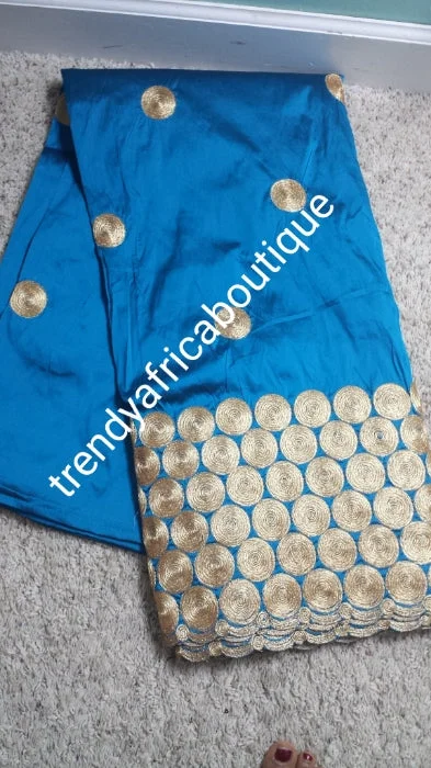 Hot sale! Original quality indian Embroidery Silk George wrapper for Nigerian party dresses. Indian-george. Beautiful turquoise Blue/gold embroidery design. Sold per 5yds. And price is for 5yds. Feel the difference in Quality!! Tunics Solid Classic Hot sale! Original quality indian Embroidery Silk George wrapper for Nigerian party dresses. Indian-george. Beautiful turquoise Blue/gold embroidery design. Sold per 5yds. And price is for 5yds. Feel the difference in Quality!! Tunics Solid Classic